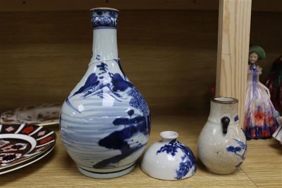 An 18th century blue and white guglet and a Guangxu brushwasher and a small crackle vase